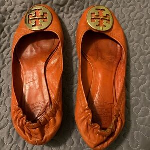 Tory Burch Burnt Orange Flats with Gold Emblem